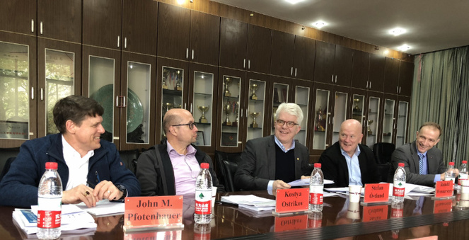 The International Evaluation Committee